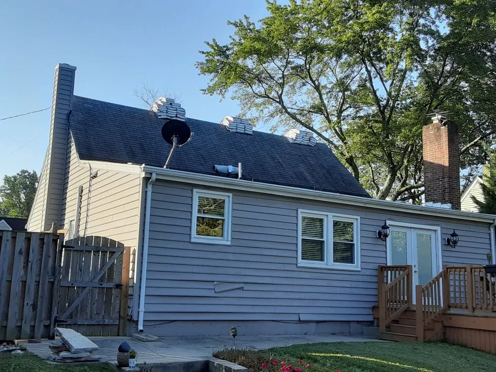 Slide of Recinos Siding Contractor