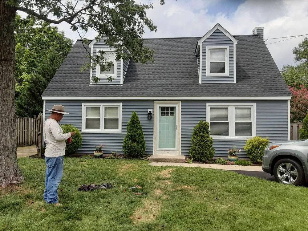 Slide of Recinos Siding Contractor