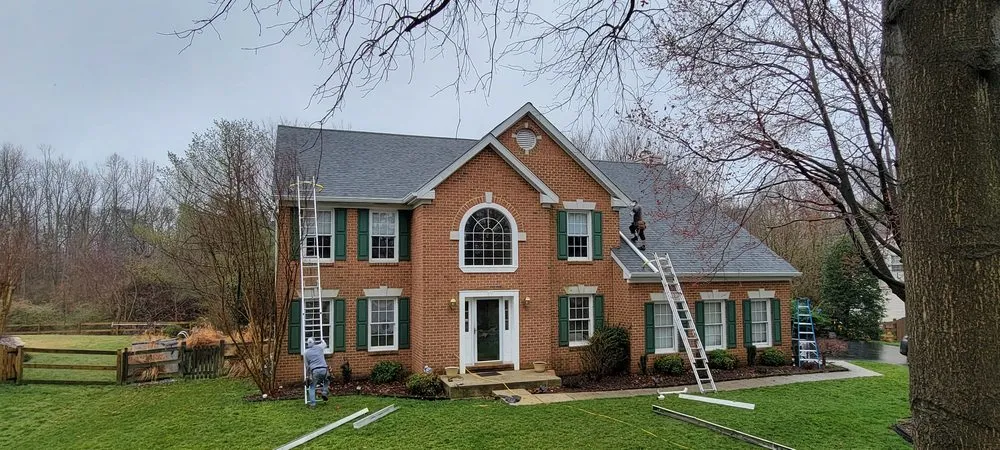 Slide of Recinos Siding Contractor