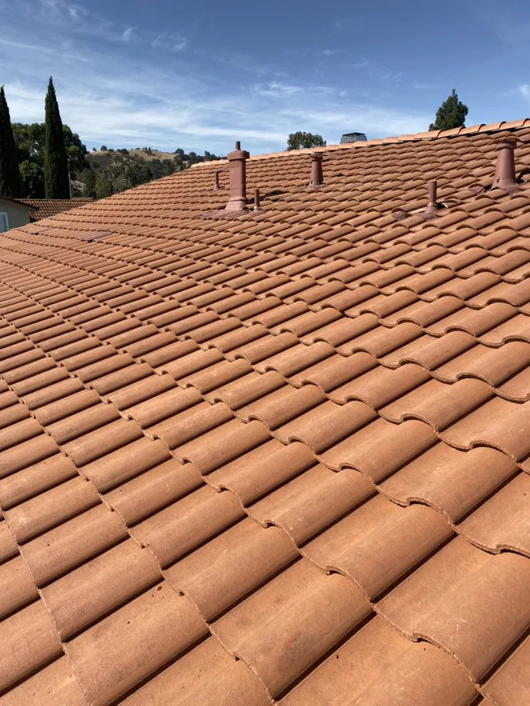 Slide of RECO Roofing