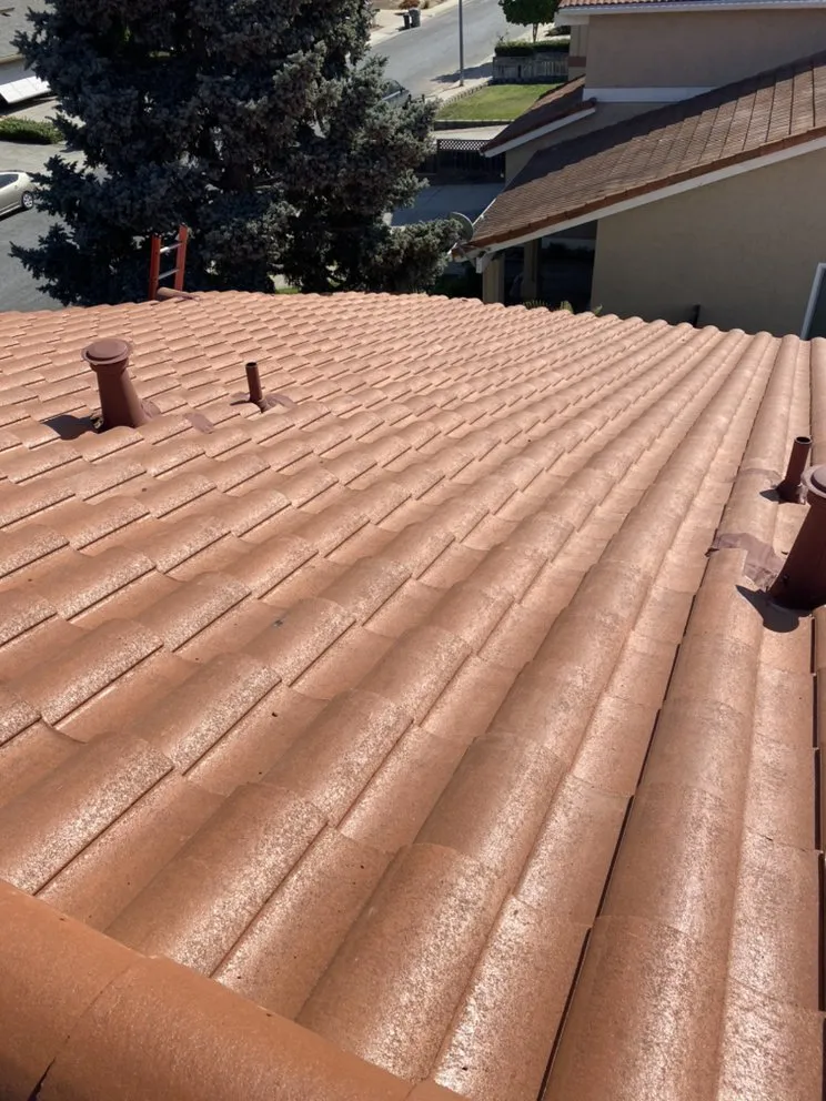 Slide of RECO Roofing