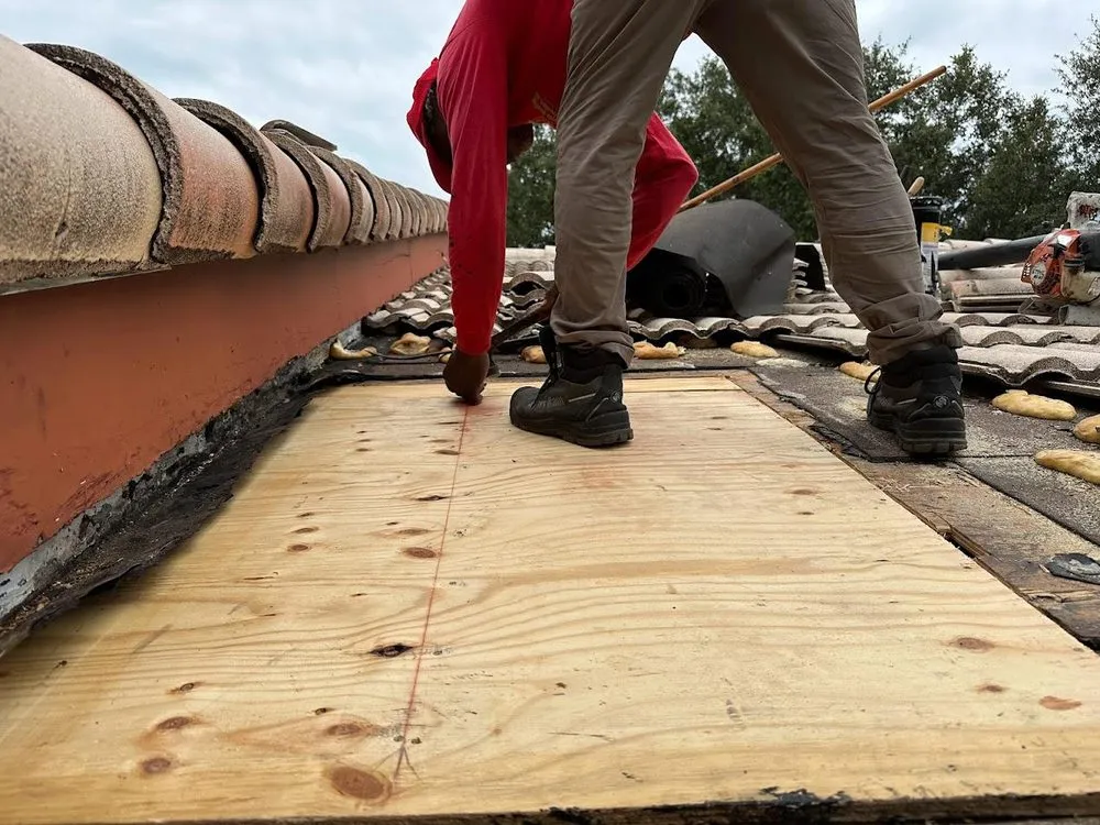 Slide of Red Apple Roofing