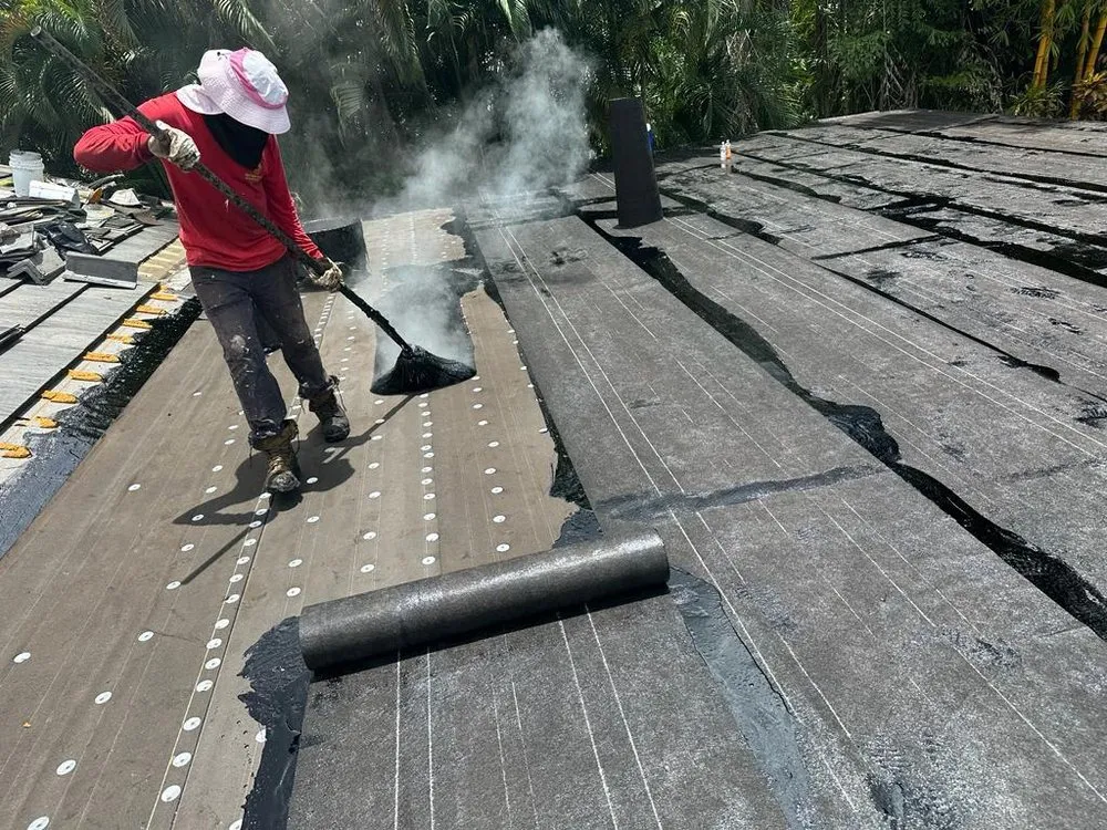 Slide of Red Apple Roofing