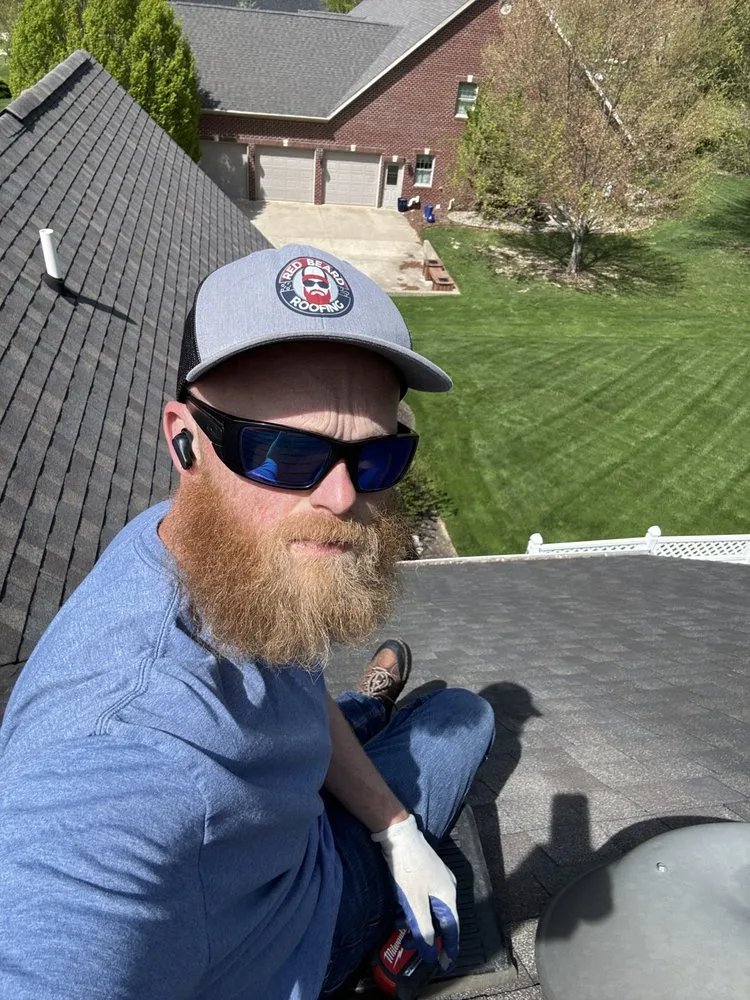 Slide of Red Beard Roofing
