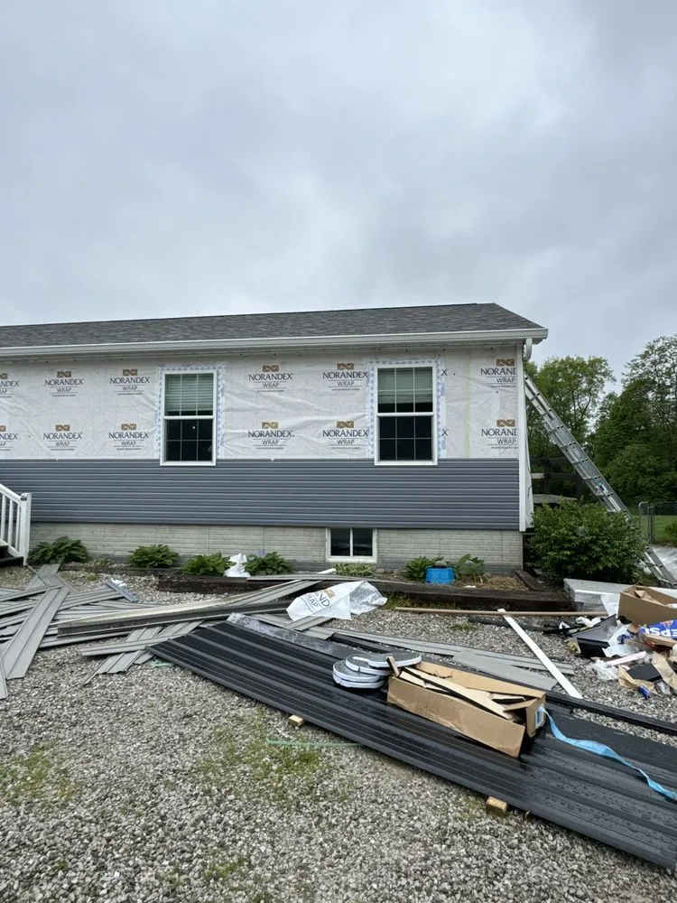 Slide of Red Beard Roofing