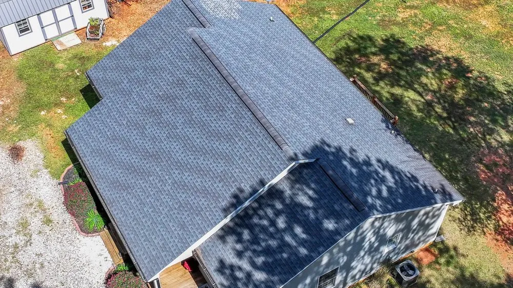 Slide of Red Bull Roofing Solutions