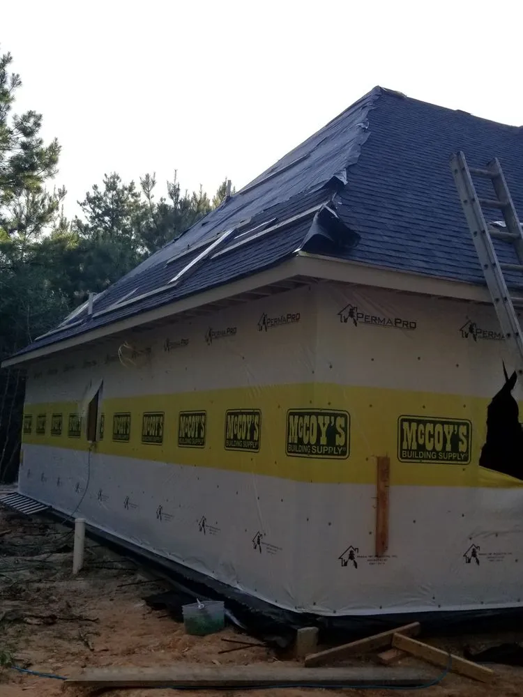 Slide of Red Bull Roofing Solutions