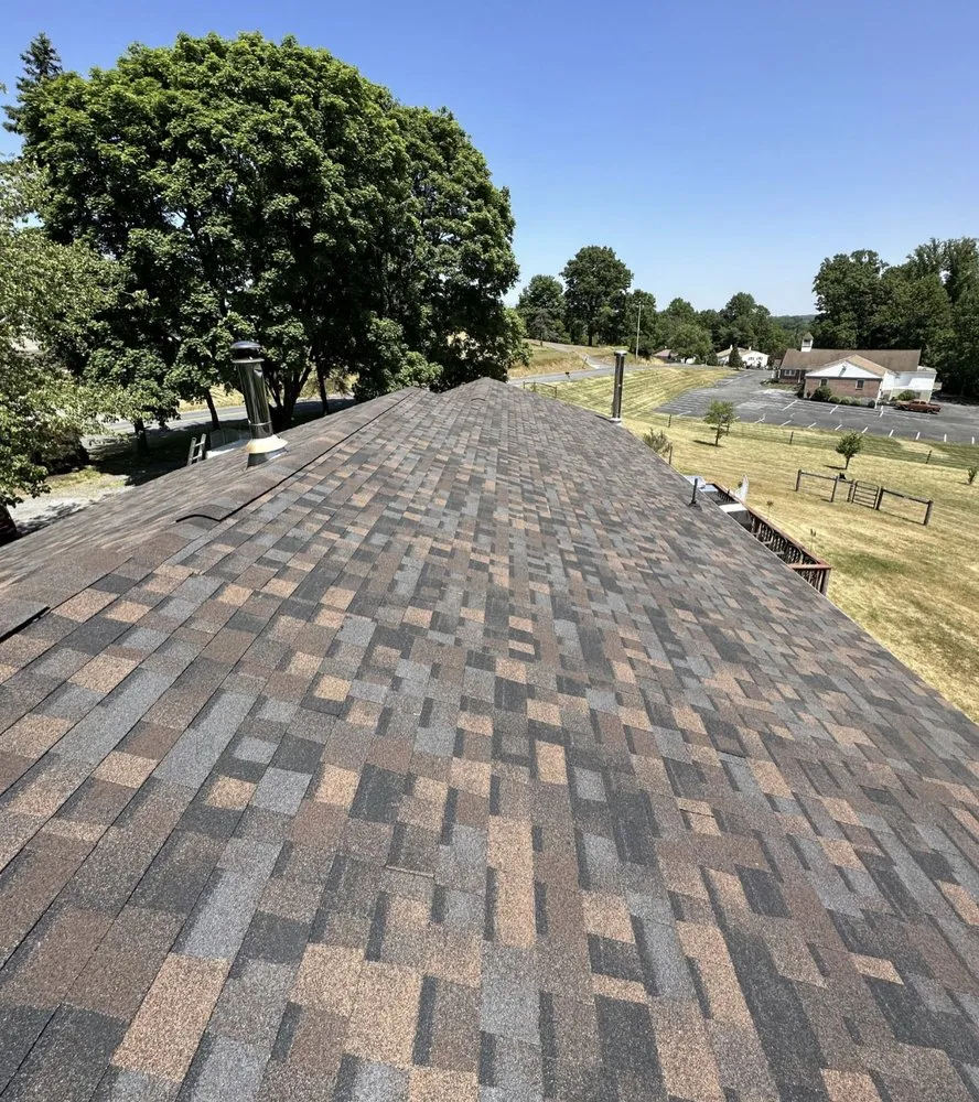 Slide of Red Cedar Roofing and Siding