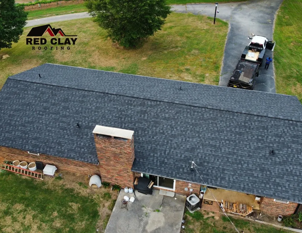 Emergency storm damage roof repair in Eastanollee, GA by Red Clay Roofing