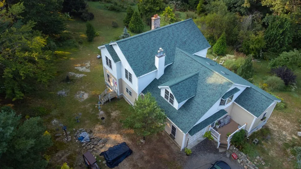 Slide of Red Dog's Roofing