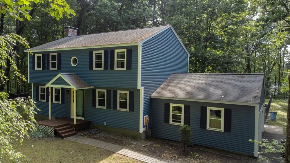 Slide of Red Dog's Roofing