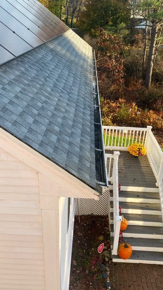 Slide of Red Dog's Roofing