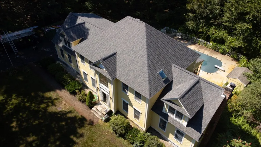 Slide of Red Dog's Roofing