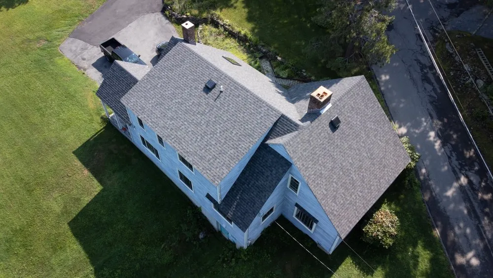 Slide of Red Dog's Roofing