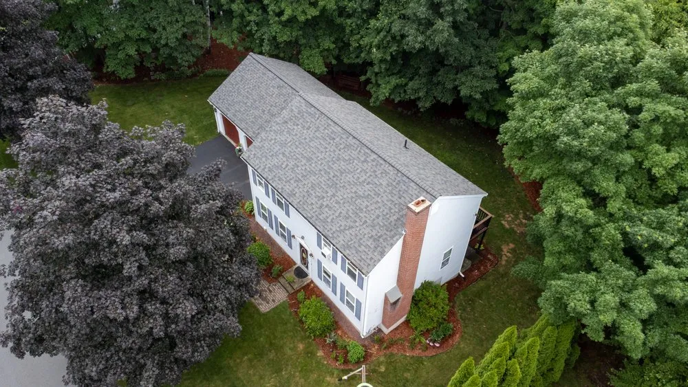 Slide of Red Dog's Roofing