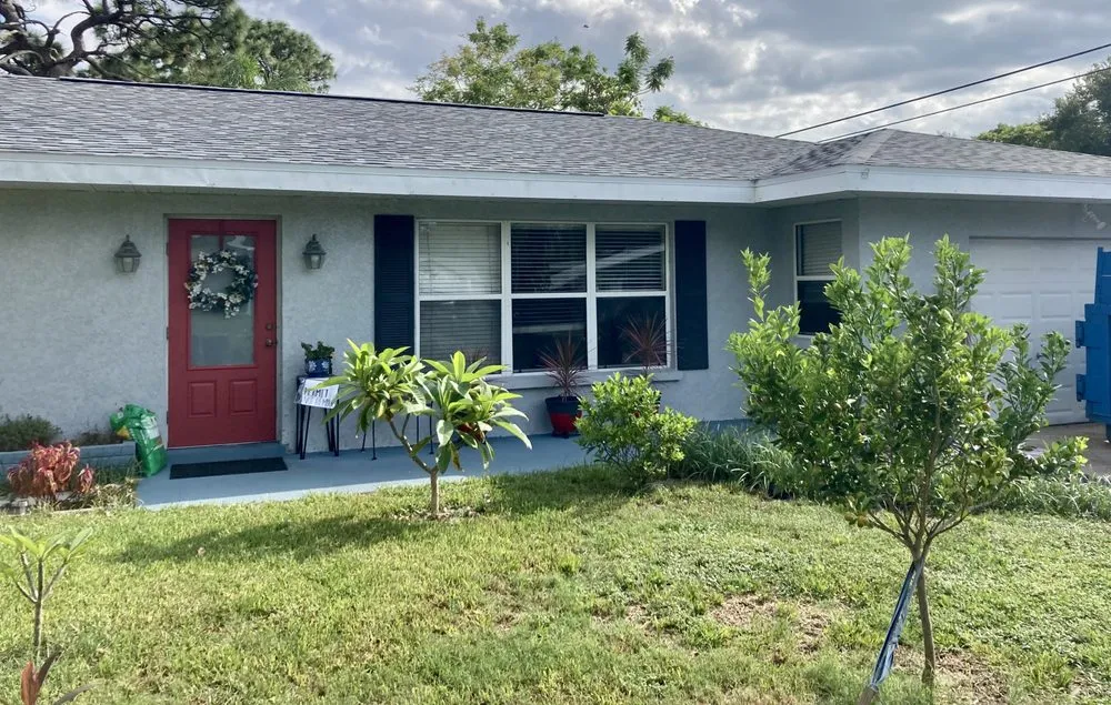 Slide of Red Dog's Roofing of Florida