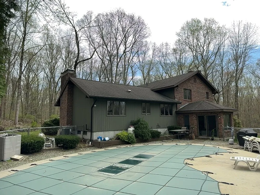 Slide of Red Dog's Roofing