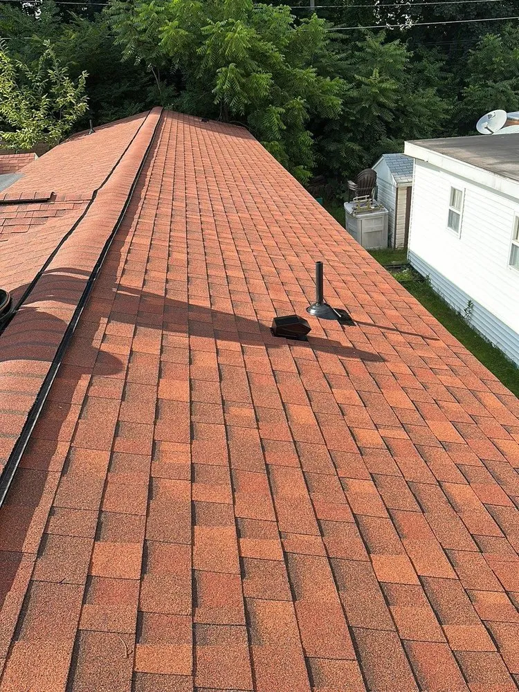 Slide of Red Dog's Roofing