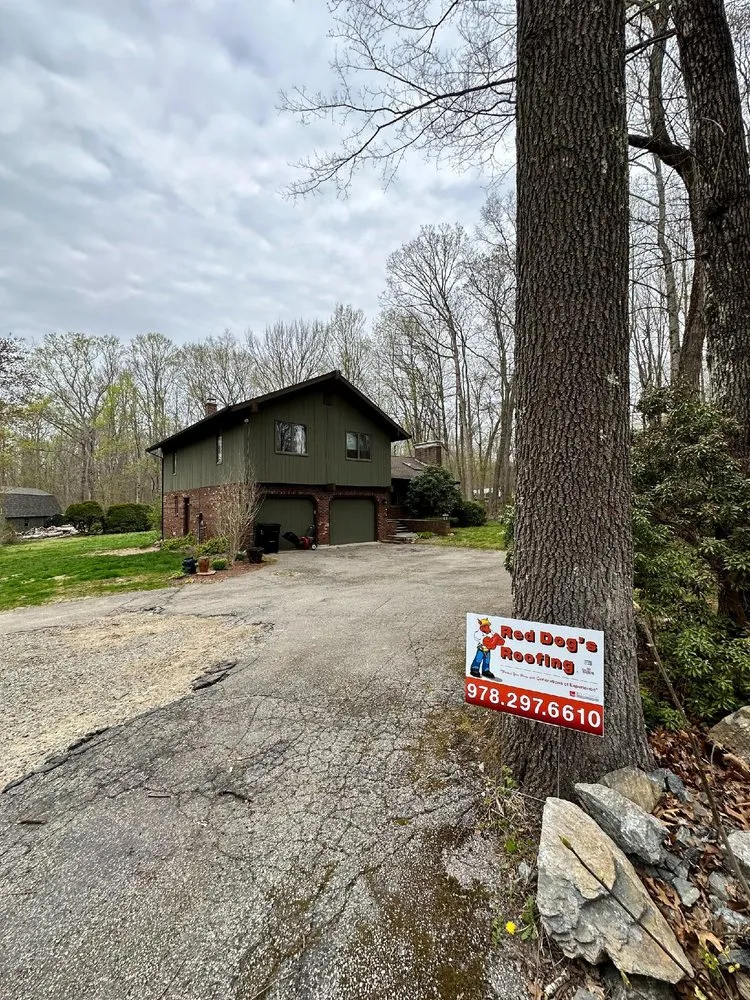 Slide of Red Dog's Roofing