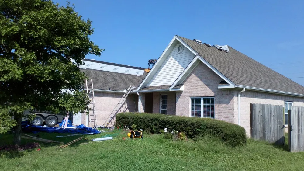 Slide of Red Hog Roofing