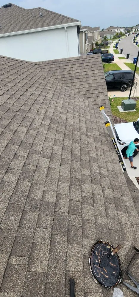 Slide of Red Pros Roofing