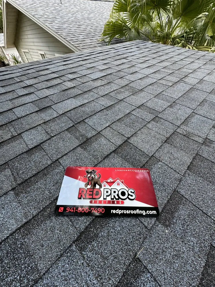 Slide of Red Pros Roofing