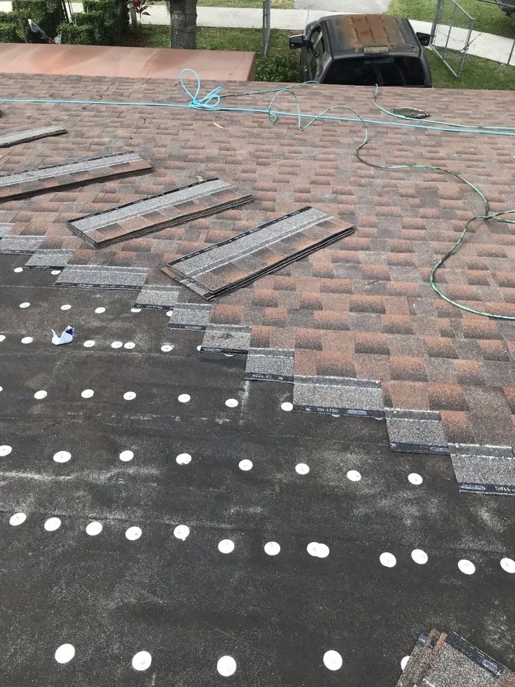 Slide of Red River Roofing