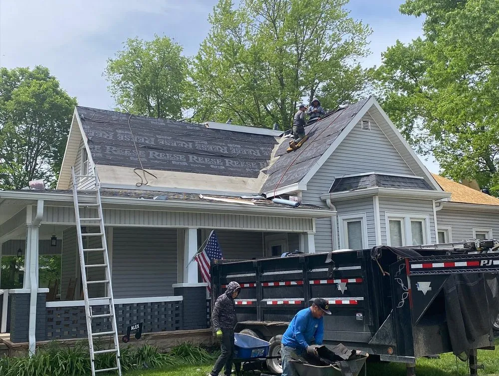 Slide of Red Sail Roofing