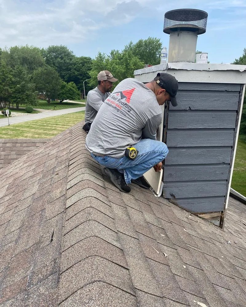 Slide of Red Sail Roofing