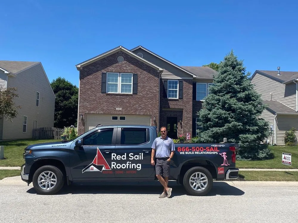 Slide of Red Sail Roofing