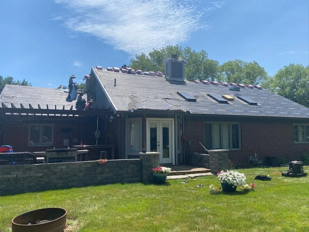 Slide of Red Sail Roofing