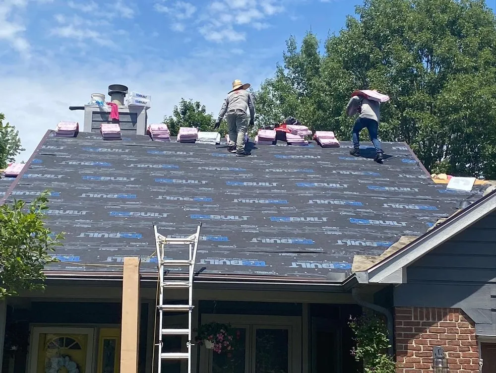 Slide of Red Sail Roofing