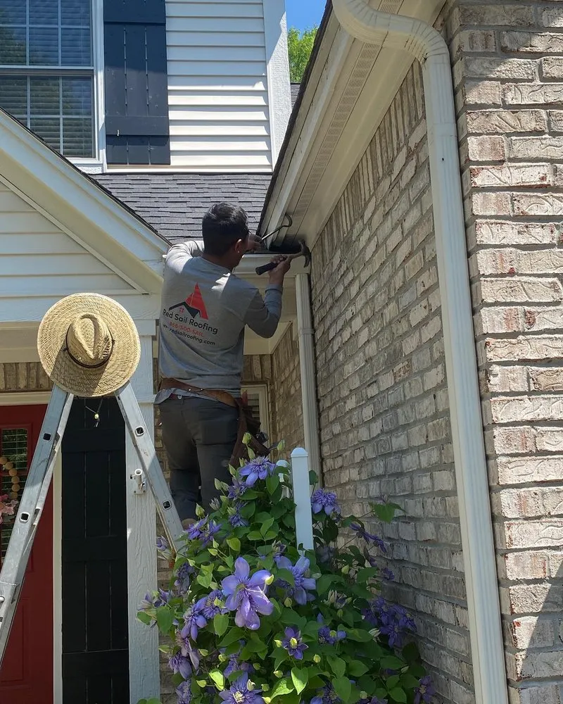 Slide of Red Sail Roofing