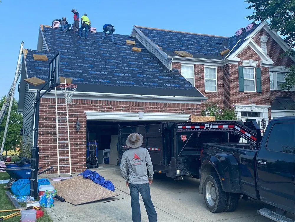 Slide of Red Sail Roofing