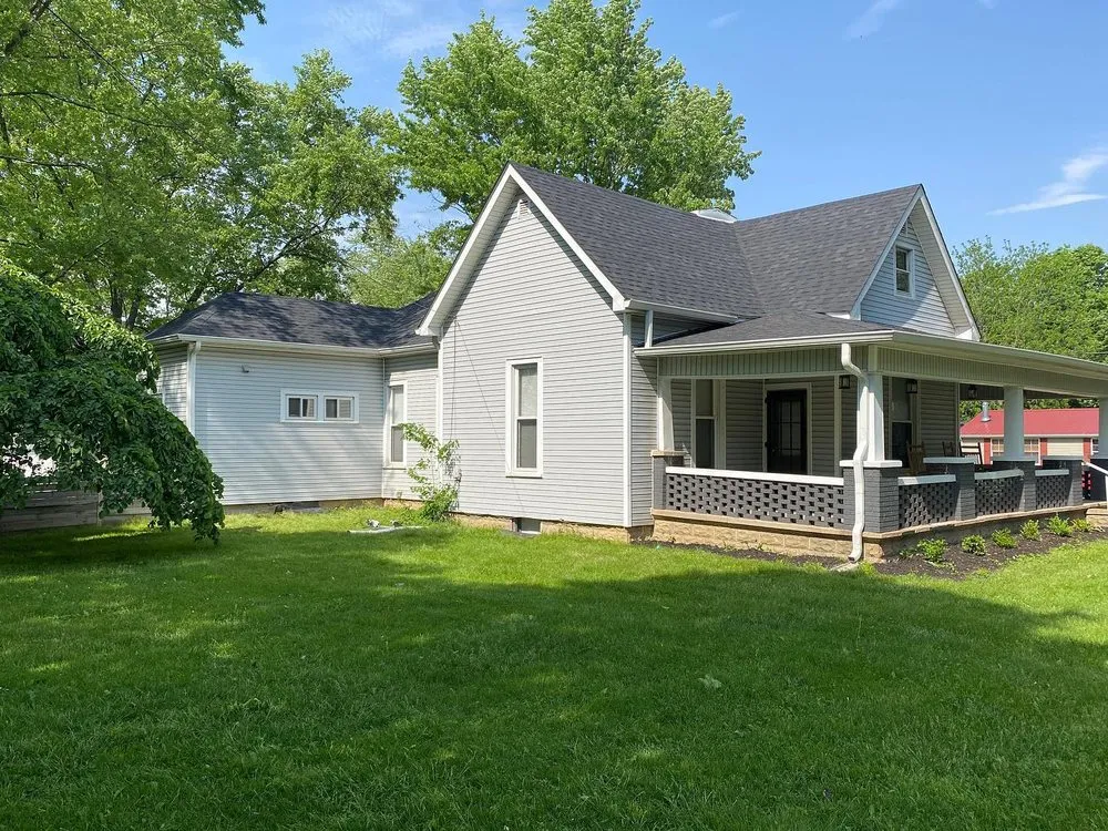 Slide of Red Sail Roofing