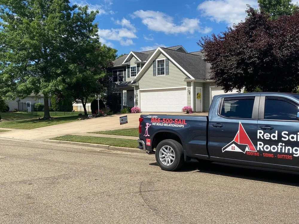Slide of Red Sail Roofing