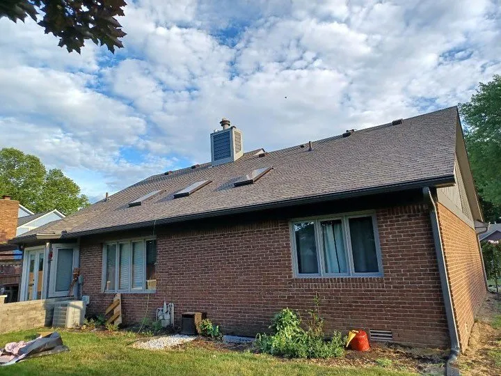 Slide of Red Sail Roofing