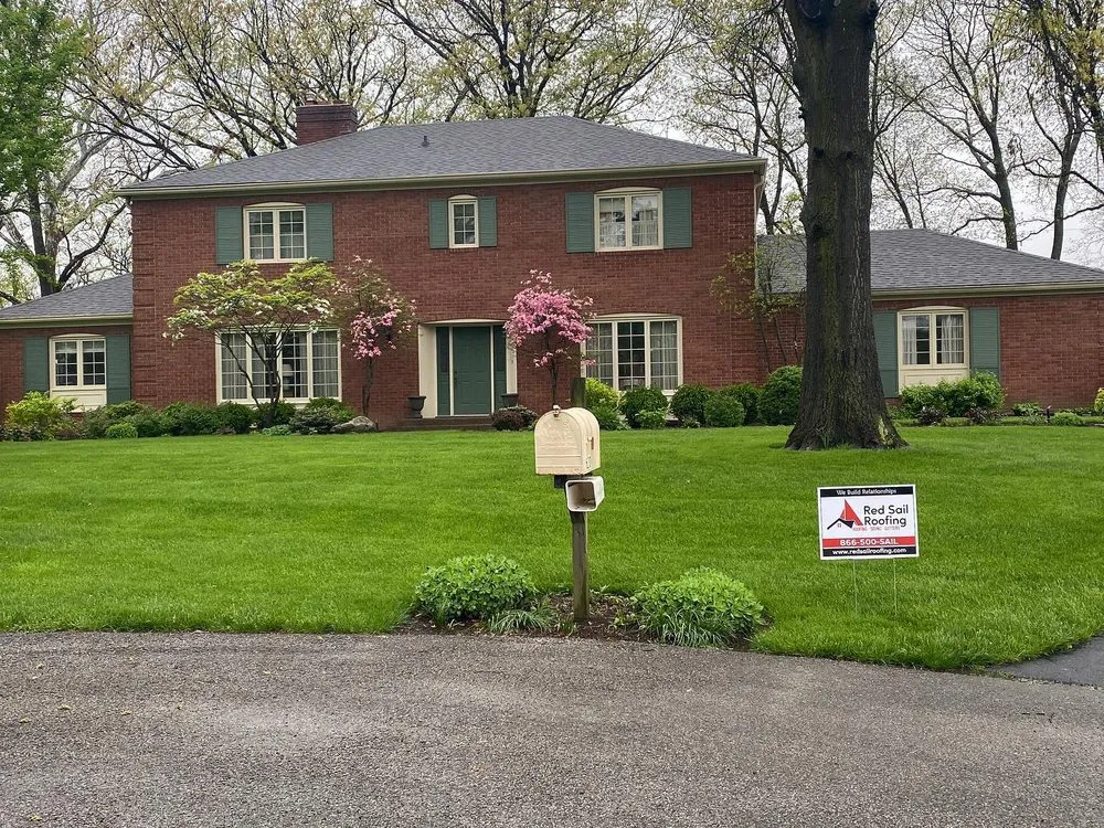 Slide of Red Sail Roofing