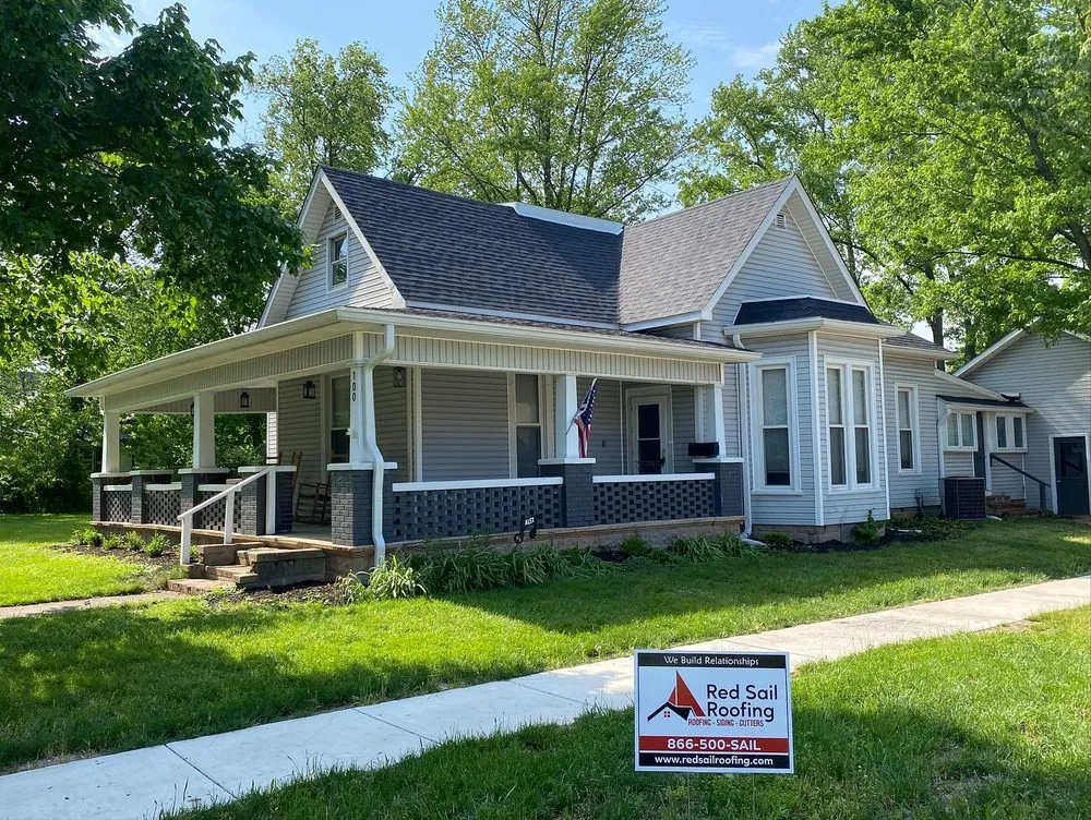 Slide of Red Sail Roofing