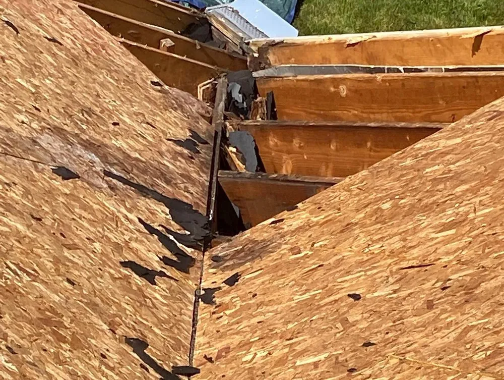 Slide of Red Sail Roofing