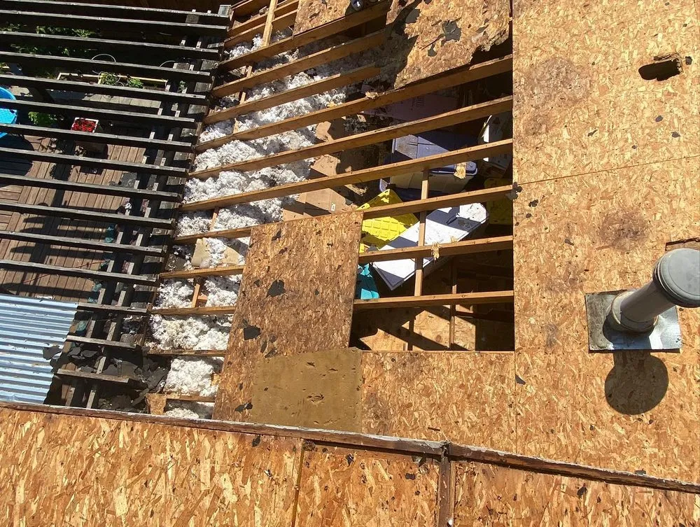 Slide of Red Sail Roofing