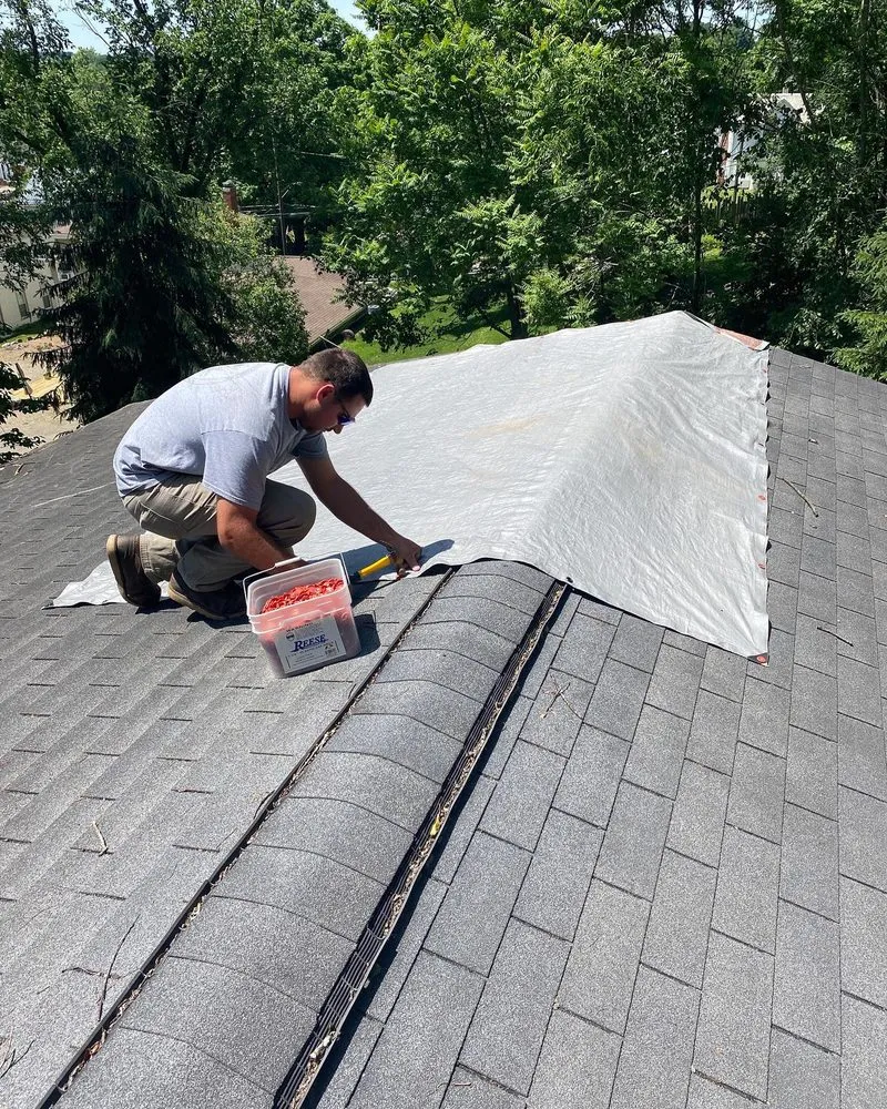 Slide of Red Sail Roofing