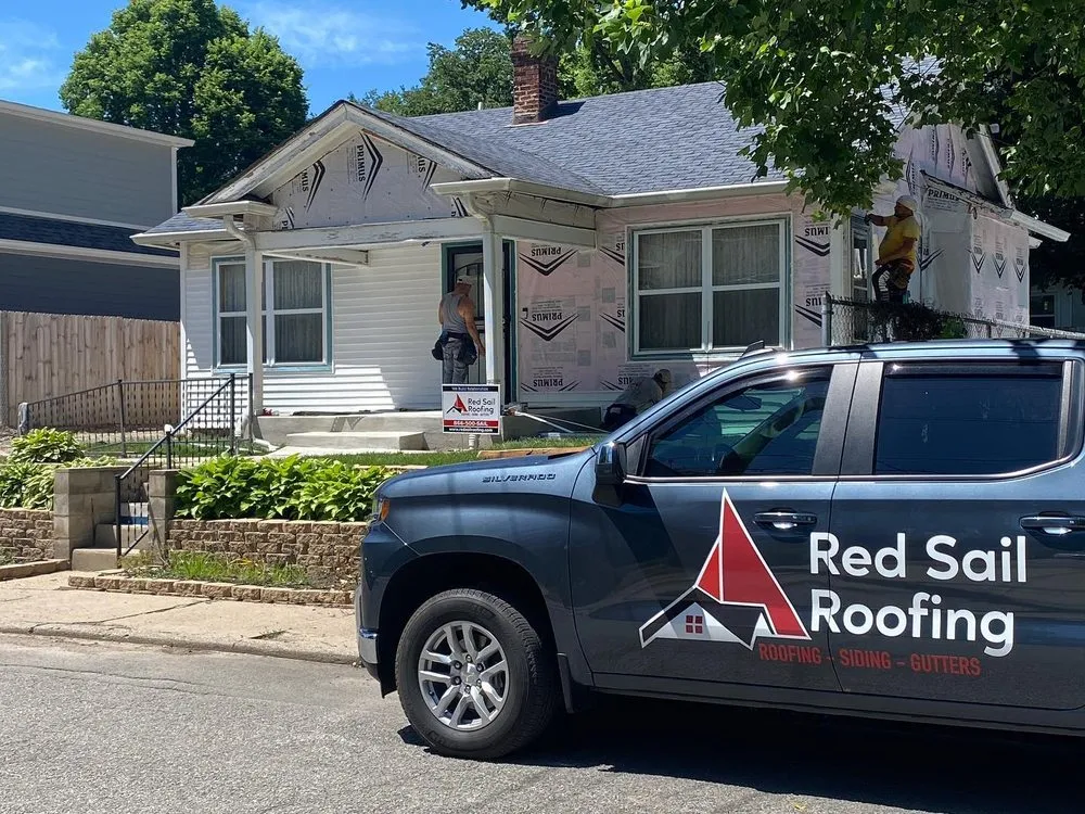 Slide of Red Sail Roofing