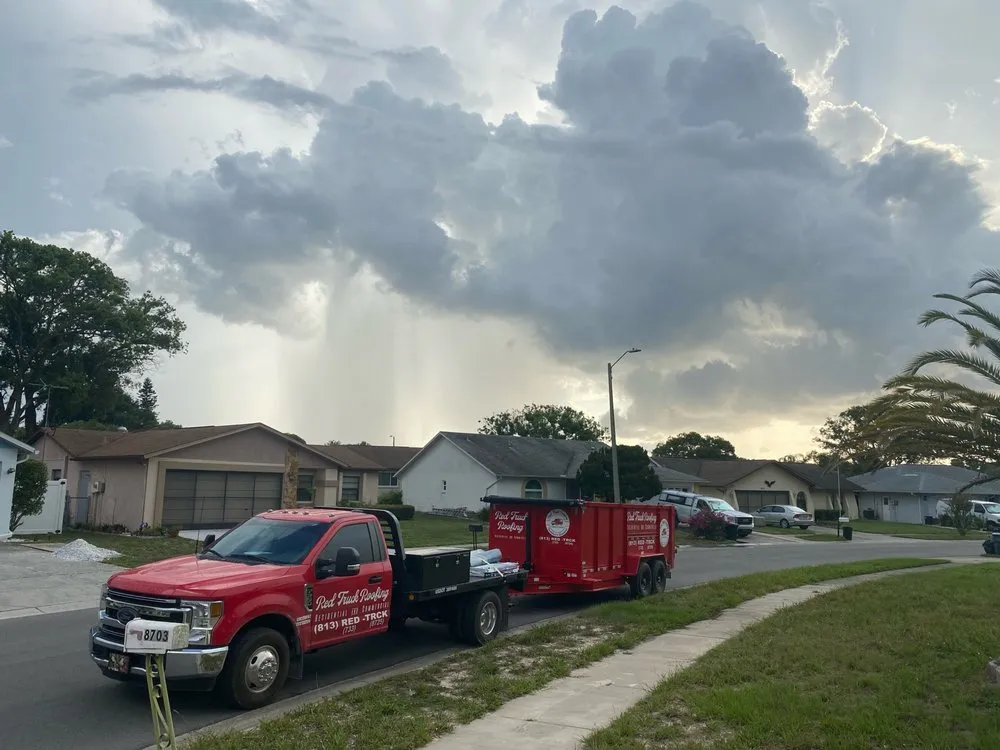 Slide of Red Truck Roofing