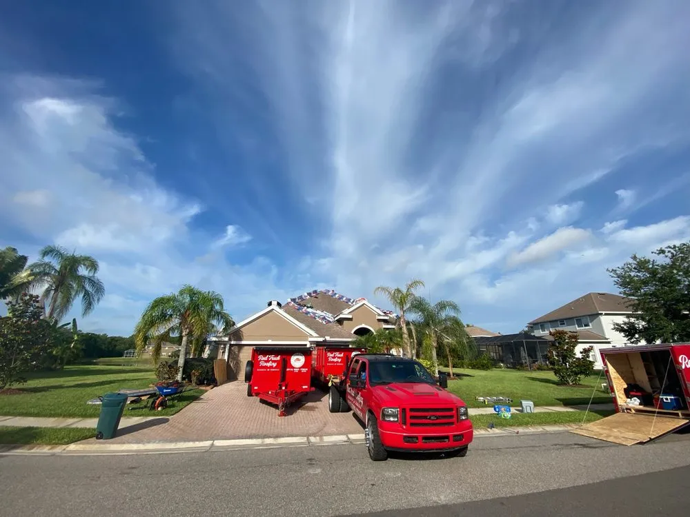 Slide of Red Truck Roofing