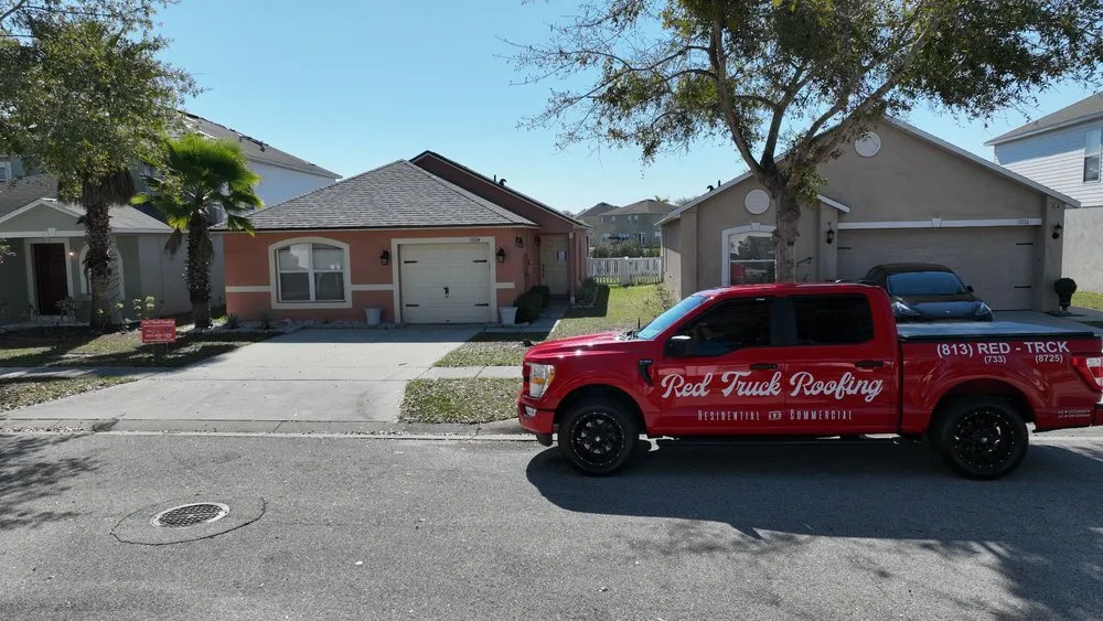 Slide of Red Truck Roofing