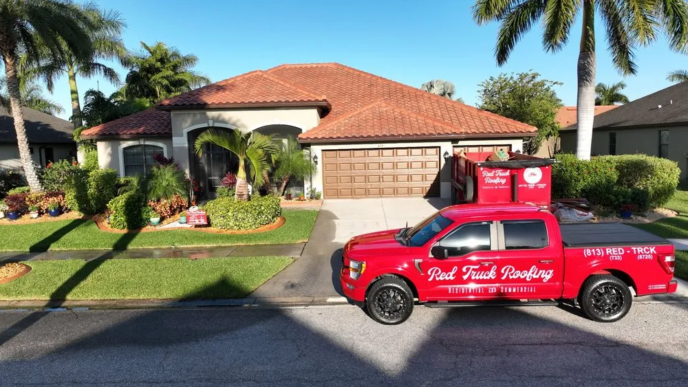 Slide of Red Truck Roofing