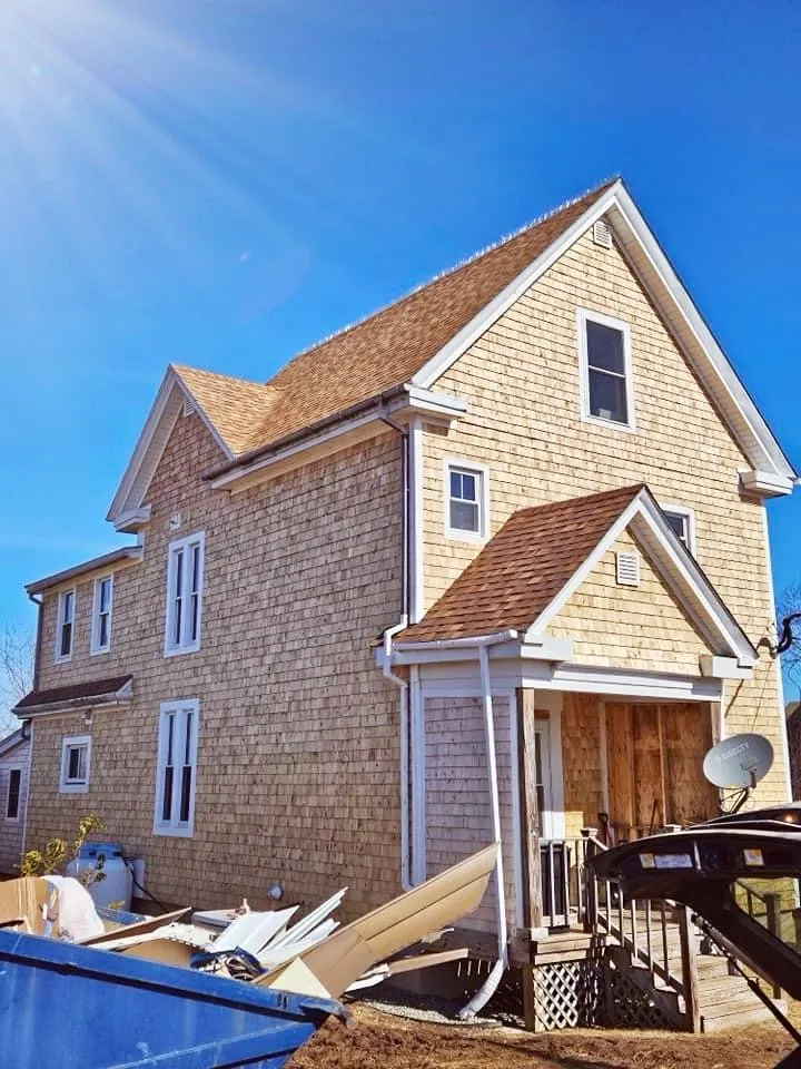 Slide of RedBeards Roofing N’ Carpentry