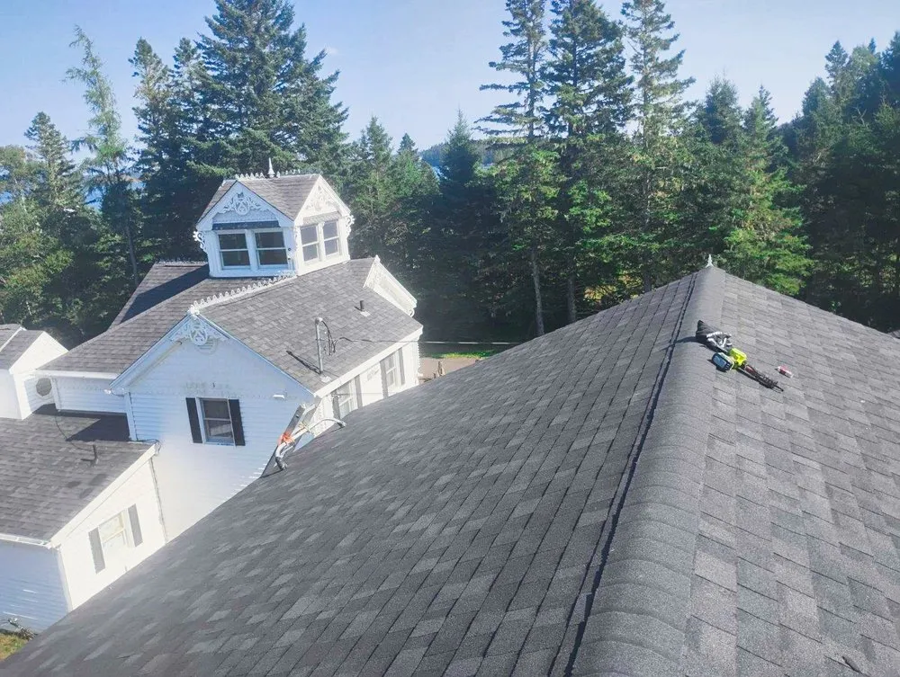 Slide of RedBeards Roofing N’ Carpentry