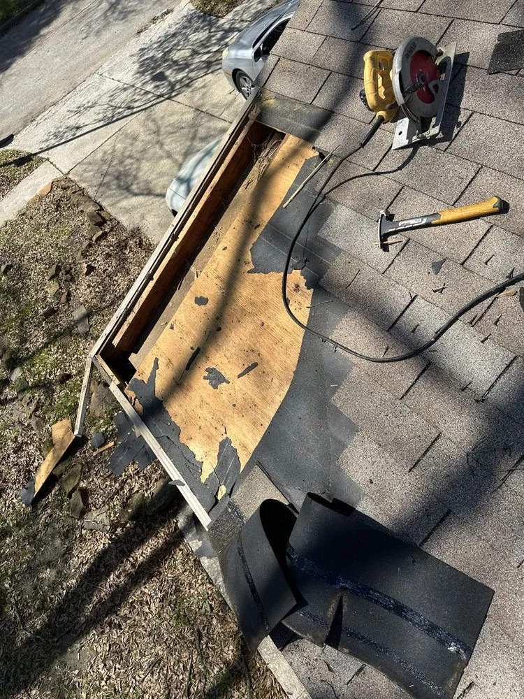 Slide of Redeemer Roofing